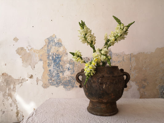 At Easter time, fruit and honey preserves are usually made. They used to be kept in clay containers with a special shape, this "honeydew" preserve is given as an offering and is shared with family and neighbors. This type of container does not exist anymore. It dates circa 1940 and come from Nahulá, Solola.