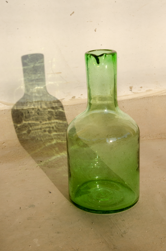 green glass water pitcher artisan made in guatemala